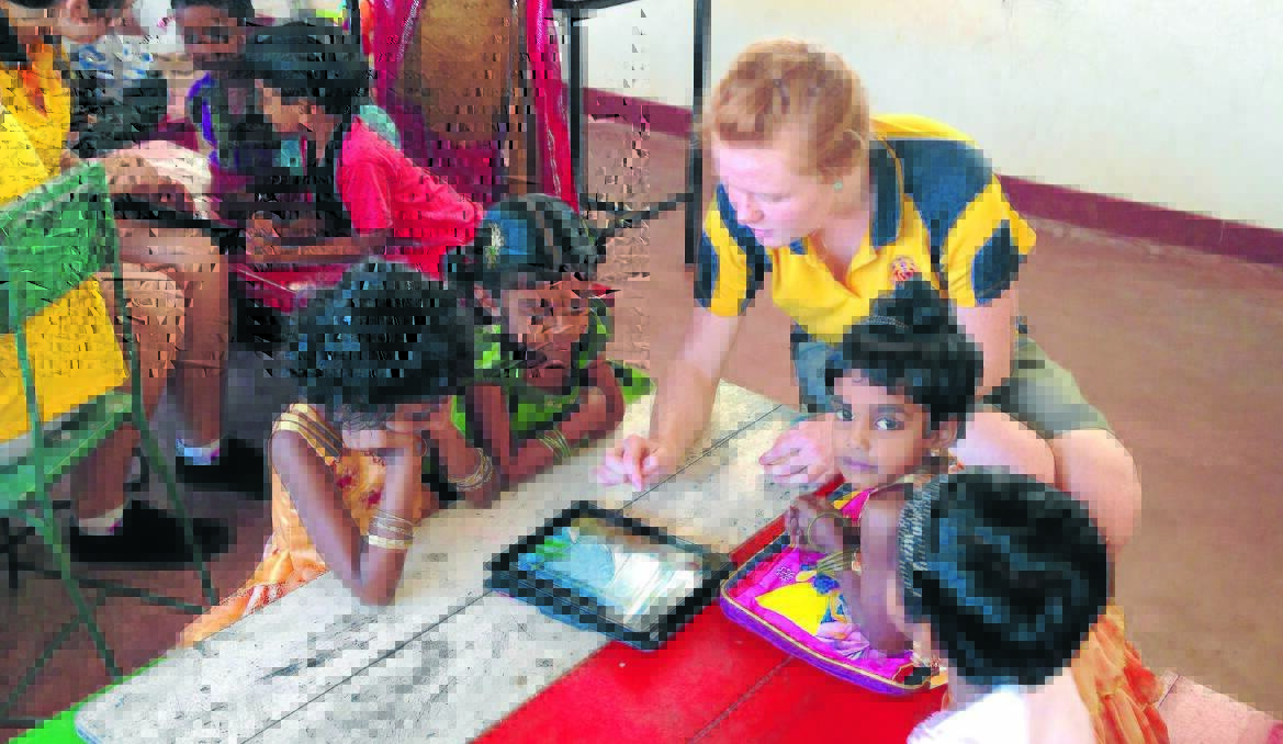 UNFORGETTABLE: Eliza Brettschneider teaches students in Sri Lanka. 