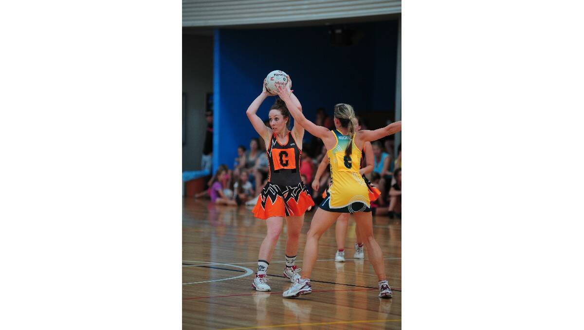 SUPPORT: Centre Tegan Dray looks for an Orange teammate in last year's HeartKids Cup. Photo: STEVE GOSCH                                                                                               0209sgnet5