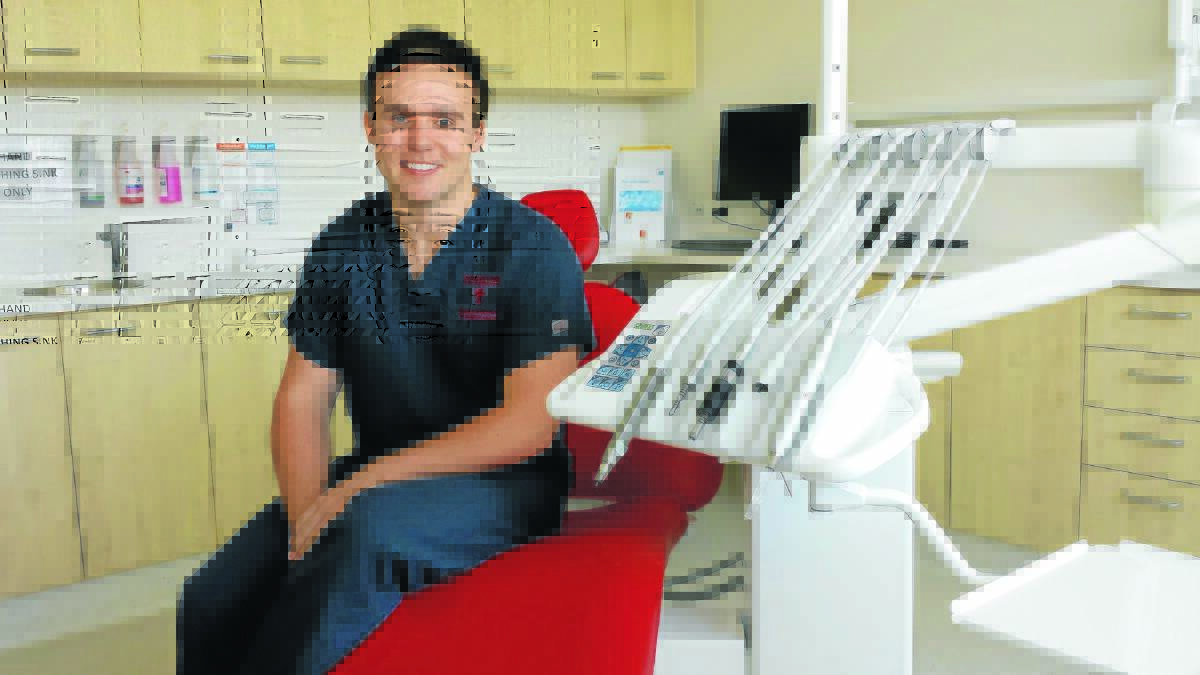 ON THE JOB: Jake Ball is excited to be one of the first graduates from the Charles Sturt University dental program.  