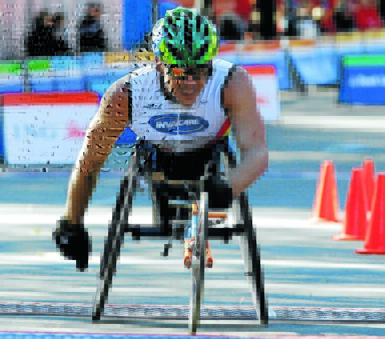 IT'S OVER: Kurt Fearnley's winning streak in the Oz Day 10k event finished yesterday, at the hands of Britain's David Weir.                                                                                     Photo REUTERS/Mike Segar