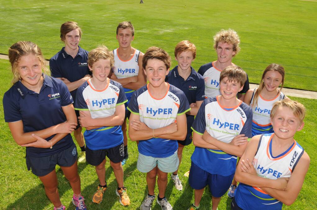 RUNNING HOT: (front left) Genevieve Gill, Sam Broadeley, Bailey Kelly, Jack Bilton, Declan Kelly, (back left) Brandon Connolly, Luke Chalker, Connor Whiteley, Tom Kotzur and Lauren Kerwick will all compete at the 2014 NSW All Schools Triathlon, at Penrith today and tomorrow. Photo STEVE GOSCH 0303sgtriathletes
