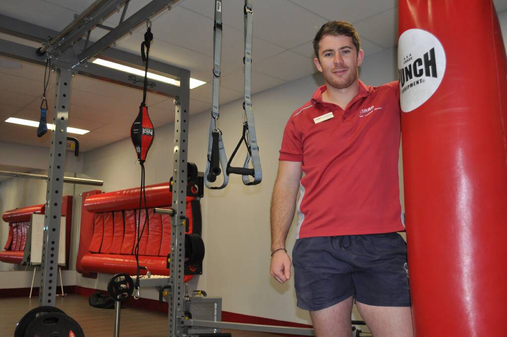 PUMP IT UP: Snap Fitness Orange club manager Darren McGregor says consistency is the key to kicking goals fitness wise in the new year. Photo: NICK McGRATH 1231nmfitness1