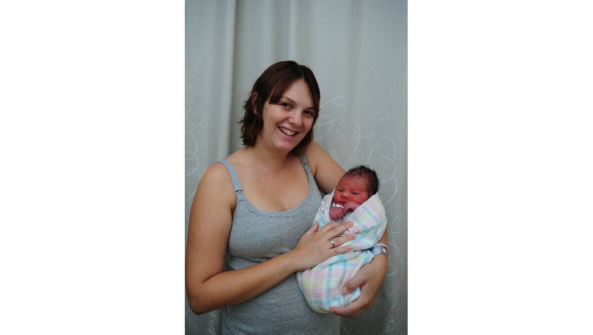 Charles Allan Law, pictured with his mother Melinda Law, was born on March 19. His father is Nick Law.