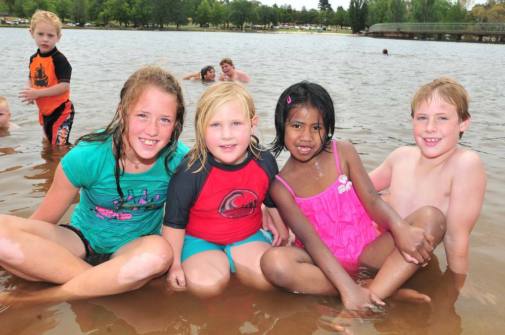 ORANGE: Kyra Dodds, Zaylee Quinn, Lina Lavall and Codi Quinn cool off at Lake Canobolas on new Year's Day. Photo: LUKE SCHUYLER