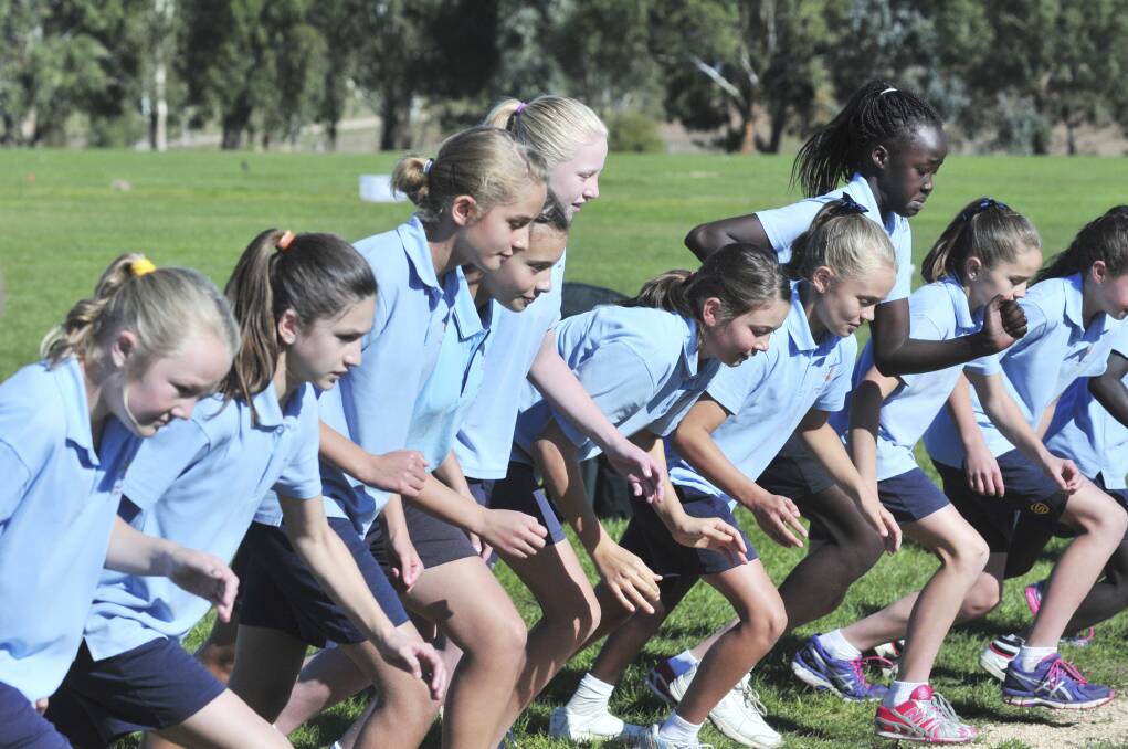 ON YOUR MARKS: Catherine McAuley students ready to race. Photo: JUDE KEOGH