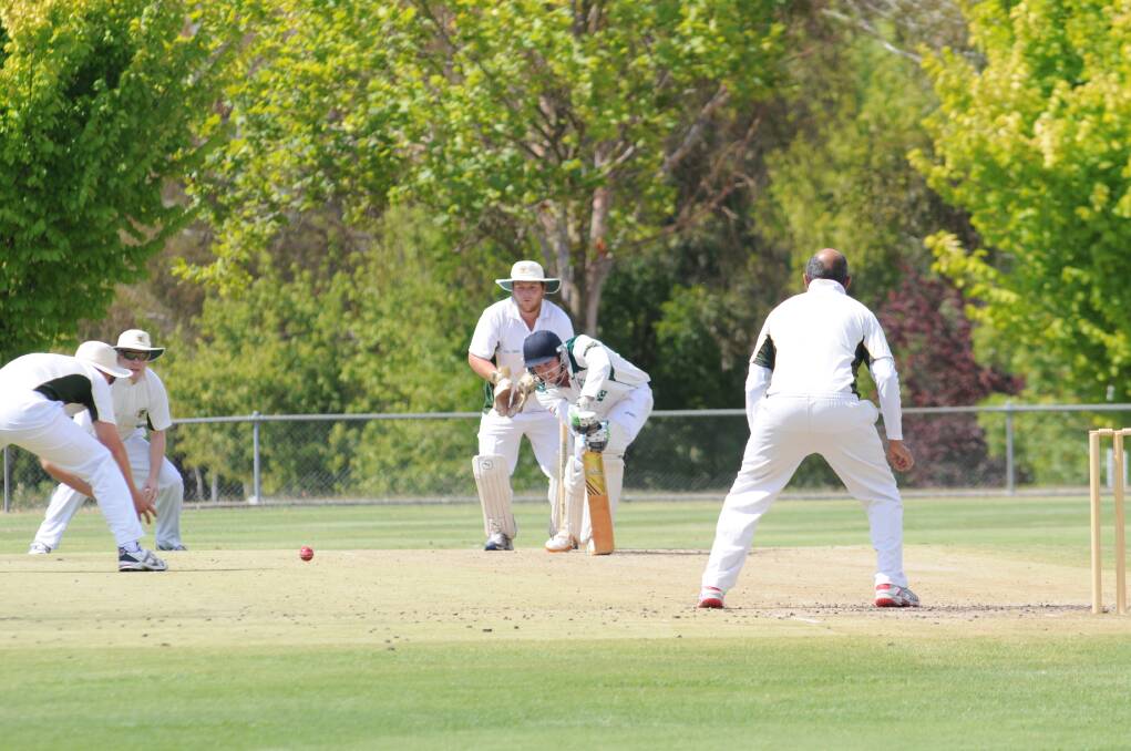 CRICKET: Orange City's John Warrington defends a delivery from CYMS' Al Dhatt at Riawena Oval on Saturday. Photo: LUKE SCHUYLER