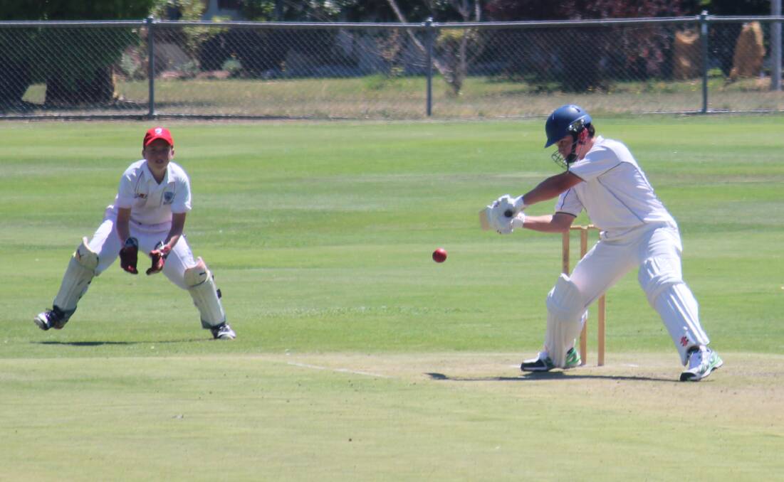 Mitchell's Ryan Peacock tries to cut one as Illawarra wicketkeeper Noah Butler watches on in their sides' game at Riawena Oval on Tuesday. Photo: MELISE COLEMAN