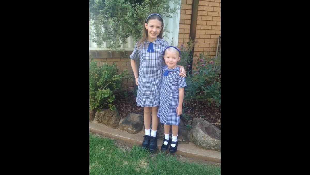 Brittany Frost with little sister Madison on her first day of kindergarten. Photo: AMANDA FROST