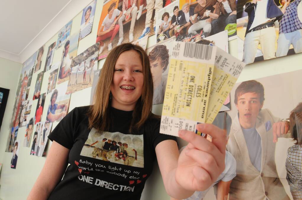TICKETS TO PARADISE: Nyassa Campbell's on her way to watch One Direction. Photo: JUDE KEOGH