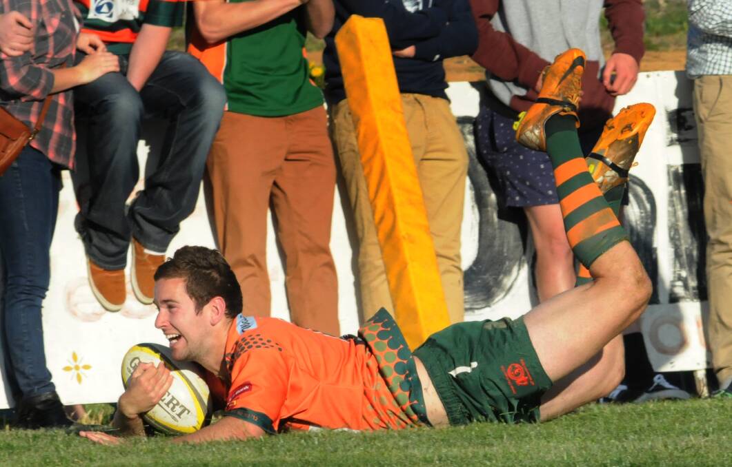 TRY TIME: Orange City's Sam Coote scores one of his two tries in the grand final.