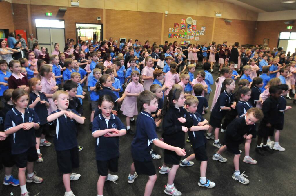 ONE VOICE: Kids at St Mary's Catholic School sing the national Count Me In song. Photo: JUDE KEOGH