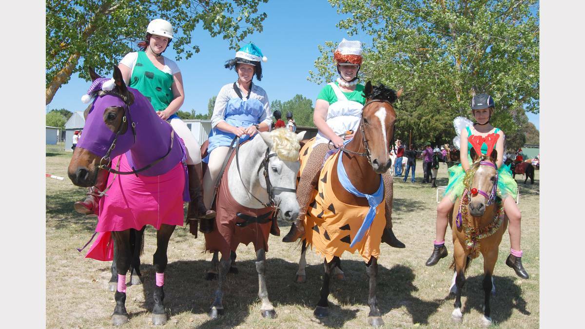 BLAYNEY: Indy Wilcox, Carly Wright, Renee Taylor and Brienne Dillan went to a lot of trouble dressing up their steads (and themselves) for the Pony Club Christmas party. Photo: WAYNE COCK