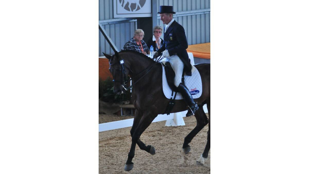 February 16 - Heath Ryan, who represented the Australian equestrian team at the 2008 Beijing Olympics, had plenty to smile about after taking out the major prize at this year's Dressage With Altitude. Photo: JUDE KEOGH 0216dressage11