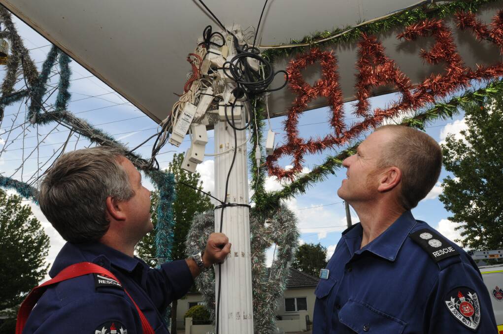 DON'T DO THIS: Orange firefighters say this is an example of what people should not do with their Christmas lights this festive season. Photo: STEVE GOSCH 1214sgsafety3