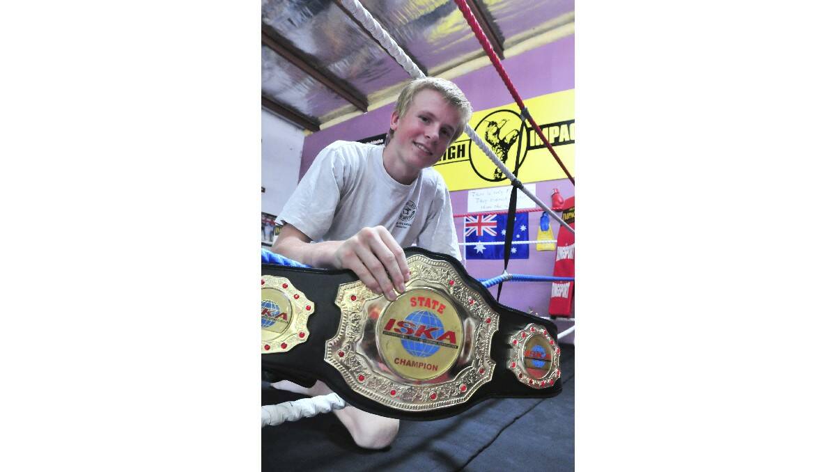 ABOVE THE BELT: High Impact's Charlie Bubb with his ISKA state champion belt. Photo: JUDE KEOGH