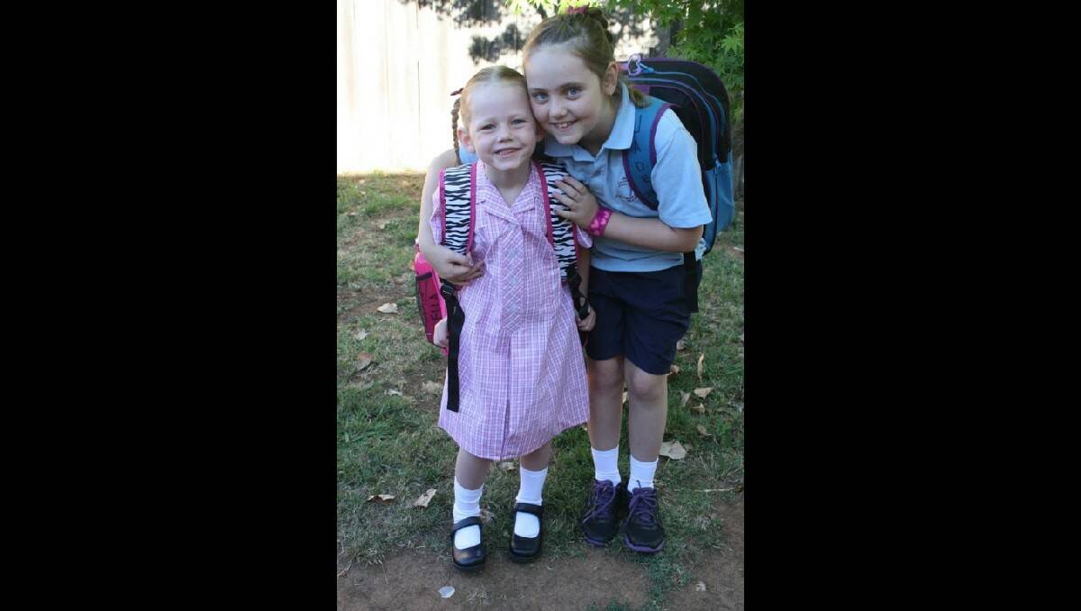 Jade and Ella Duffy on Ella's first day at Catherine McAuley Catholic Primary School. Photo: BELINDA DUFFY