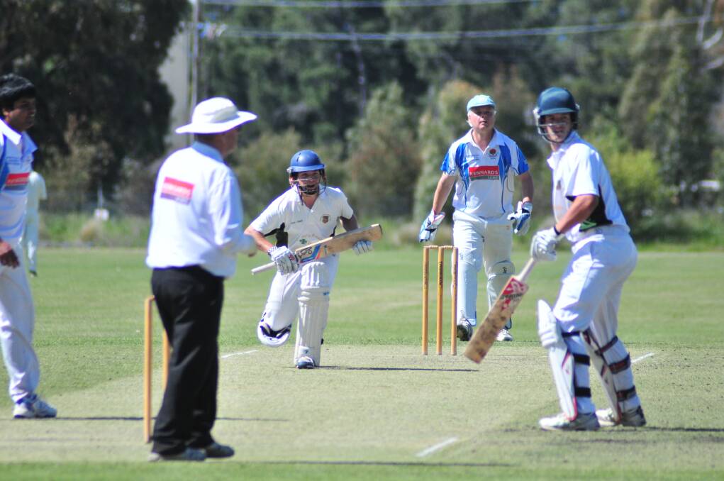 CYMS youngster Michael Hannelly looks for a run.