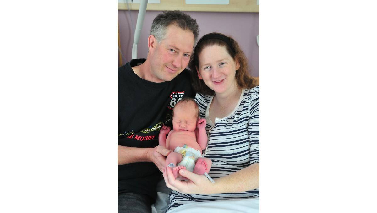 Lachlan James McClymont, pictured with parents Daniel McClymont and Samantha Crawford, was born on June 26.