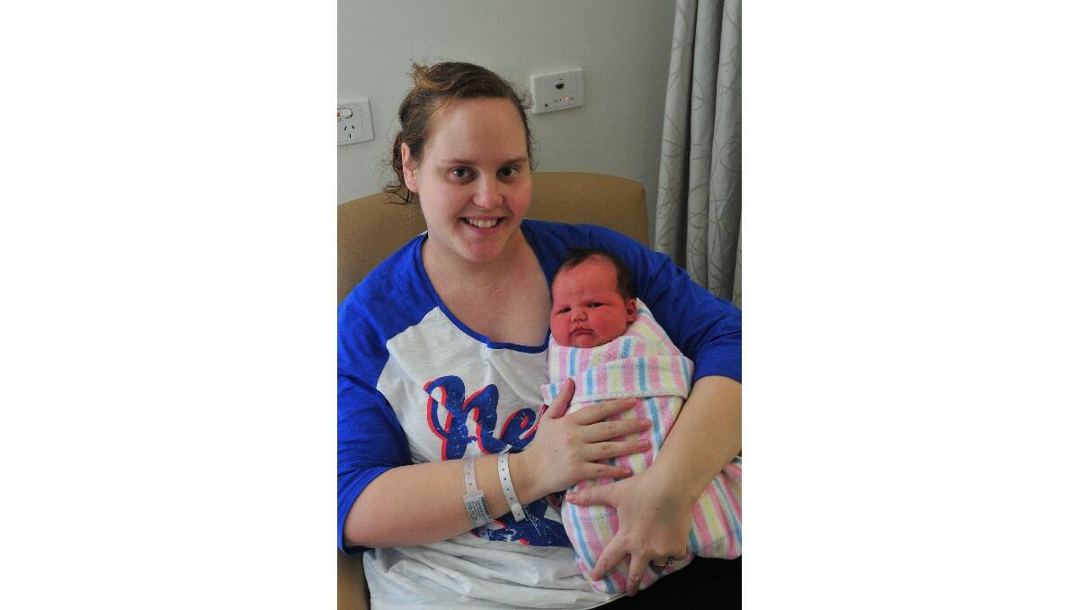 Merindah Poppy Lovett, pictured with her mother Amanda Spencer, was born on July 25.