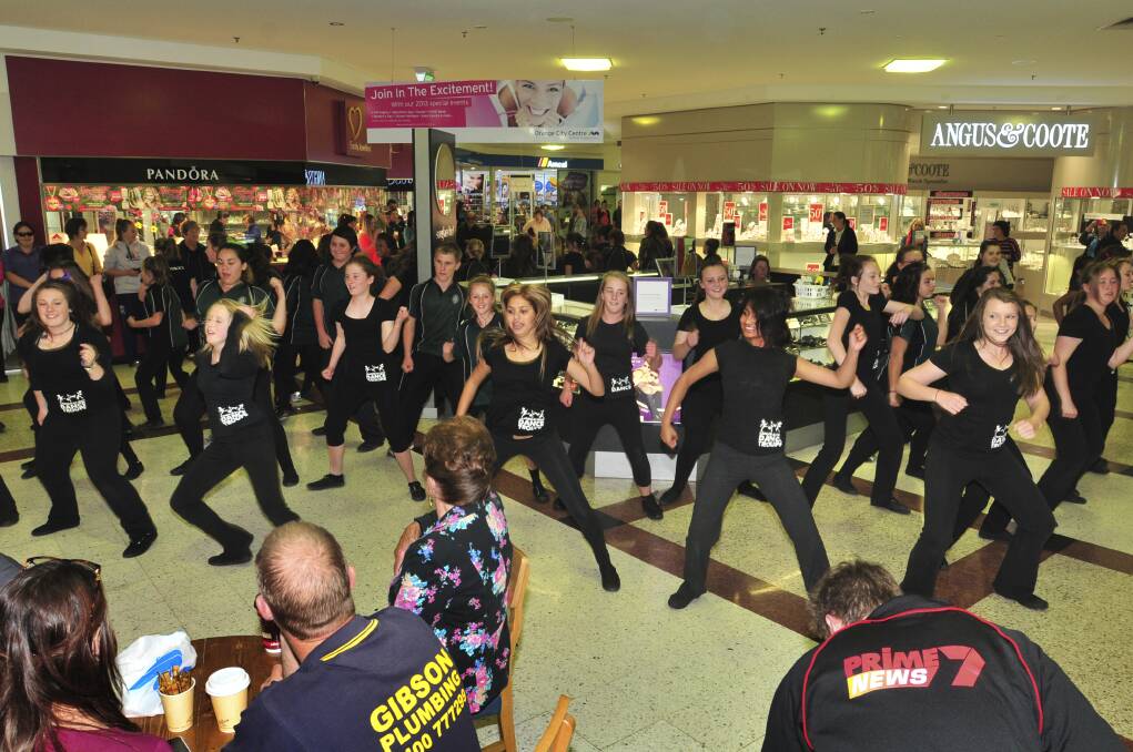 FLASHERS: A flash mob in the Orange City Centre. Photo: JUDE KEOGH