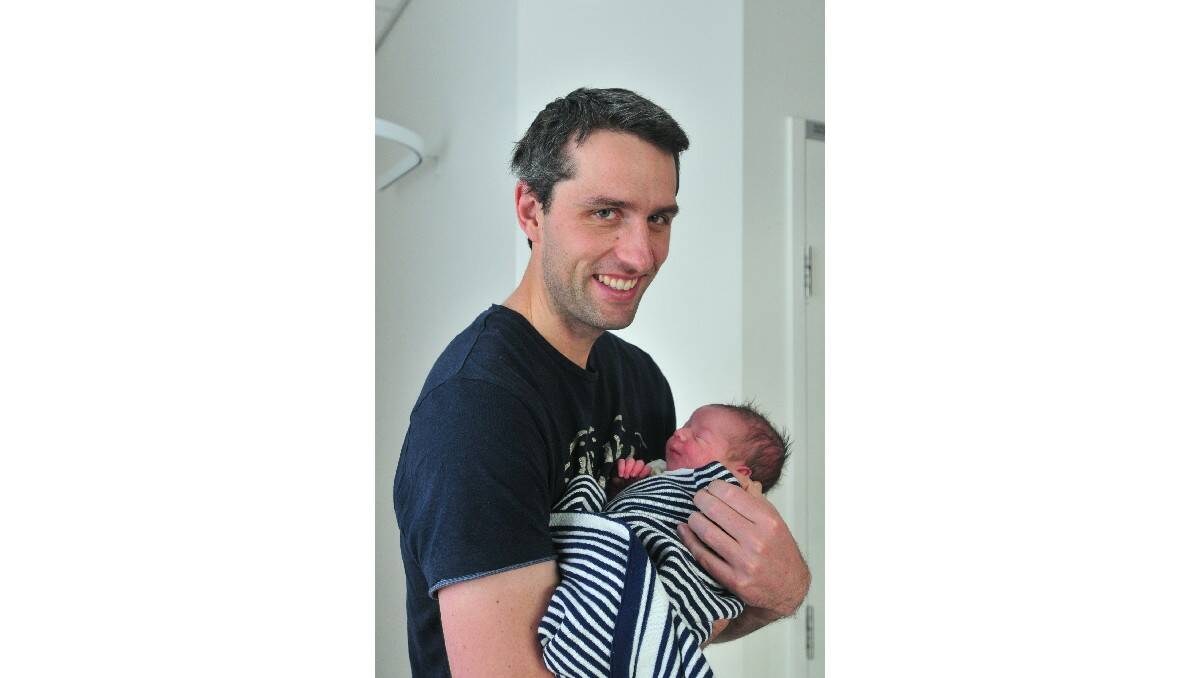 Tom Low, pictured with his father Tim Low, was born on May 22. Tom's mother is Sarah Low.