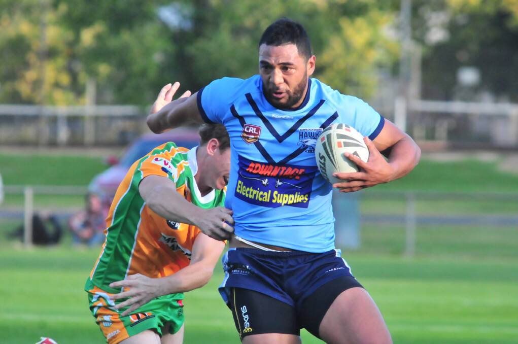 GET OUT OF MY WAY: Orange Hawks winger Tatafu Na'aniumotu charges over the CYMS defence.