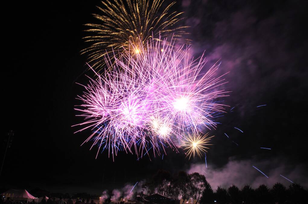 PARTY TIME: The fireworks light up the Orange skyline. Photo: STEVE GOSCH