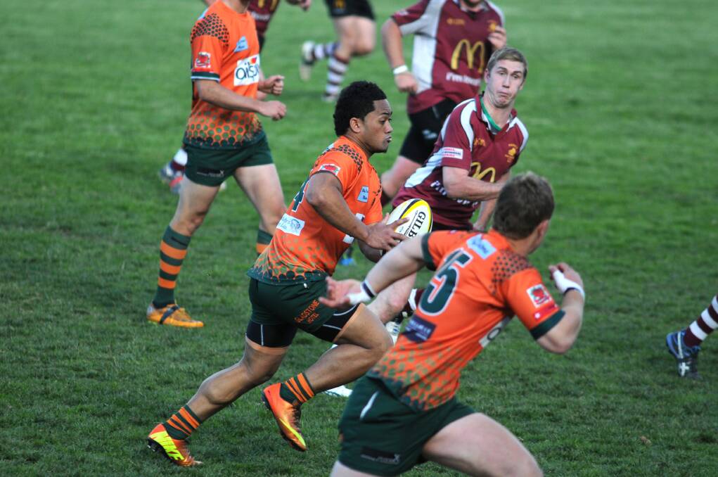 STAR: Sione 'Junior' Lafou jinks his way through the Parkes defense.