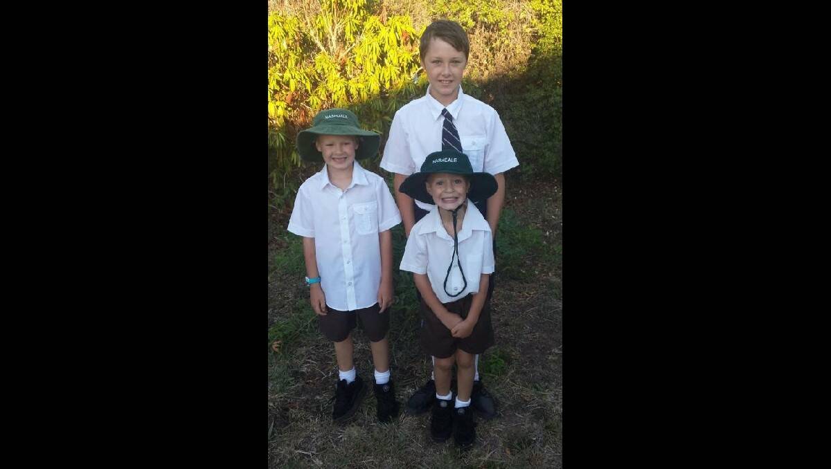 Rowan starting Year 1, Jeremy starting Year 7 at St Stanislaus College and Ethan off to kindergarten at Nashdale Public School. Photo: LAURA HANNAN