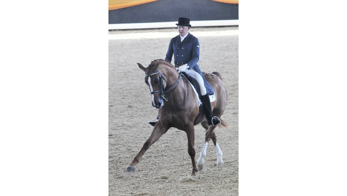 RIDING HIGH: Mark Kiddle on Waitano at the 2013 Dressage with Altitude. Photo: JUDE KEOGH