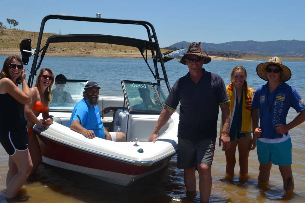 HEAT SEEKERS: Holiday makers at Burrendong Dam make the most of the warm water by getting out into the water. Photo: FARREN HOTHAM