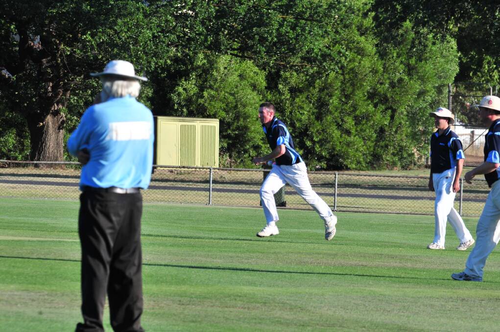 CRICKET: Molong's John Mulhall steaming in against Kinross in Friday night's Royal Hotel Cup game at Wade Park. Photo: JUDE KEOGH