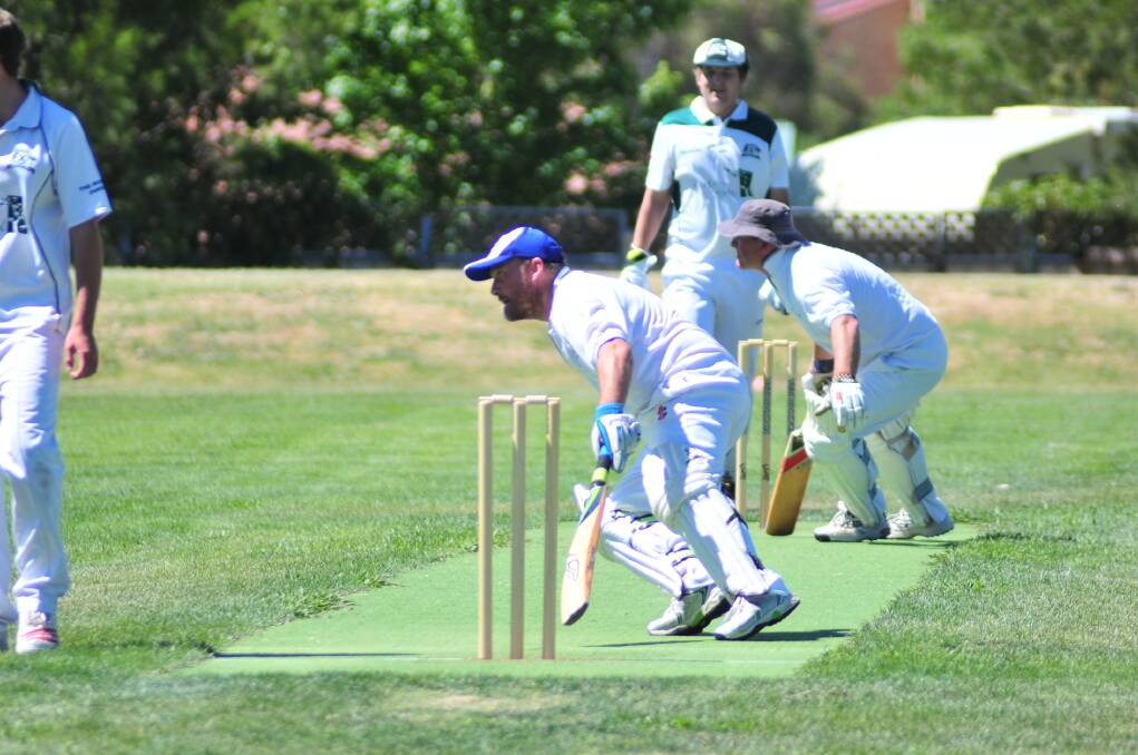 CRICKET: Gladstone's Brad Cotter and Gary Cole in ODCA second grade at Max Stewart. Photo: JUDE KEOGH