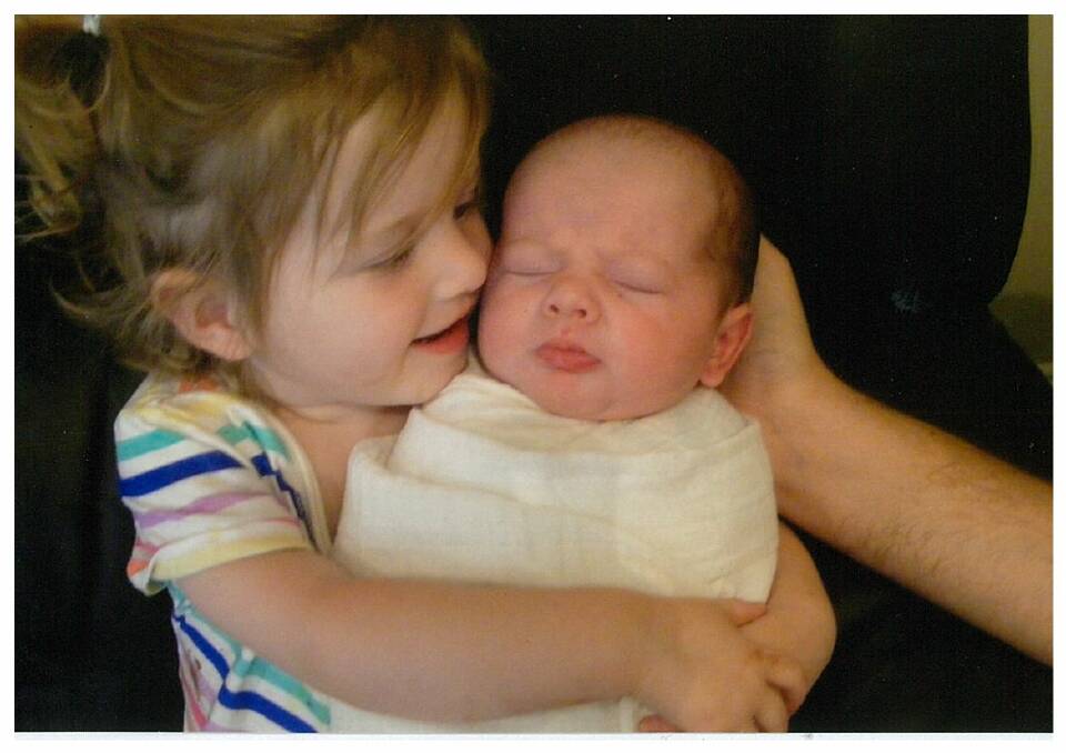 Baxter Curran, pictured with older sister Xanthie, was born on January 17. Baxter's parents are Rachael and Adam Curran.