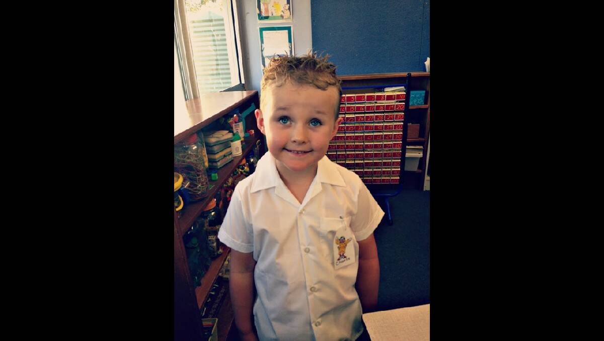 Charlie Fossilo at his first day of kindergarten at Canobolas Public School. Photo: LOUISE FOSSILO