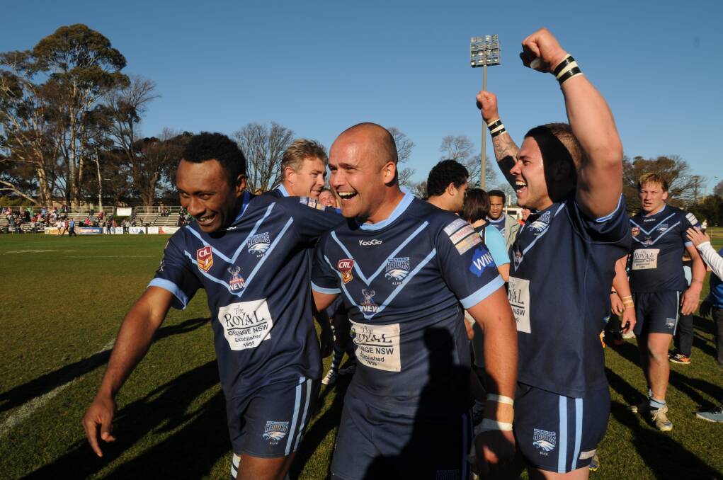 OH, WHAT A FEELING: Hawks players celebrate their 12-11 major semi-final win over CYMS, qualifying them for the grand final.