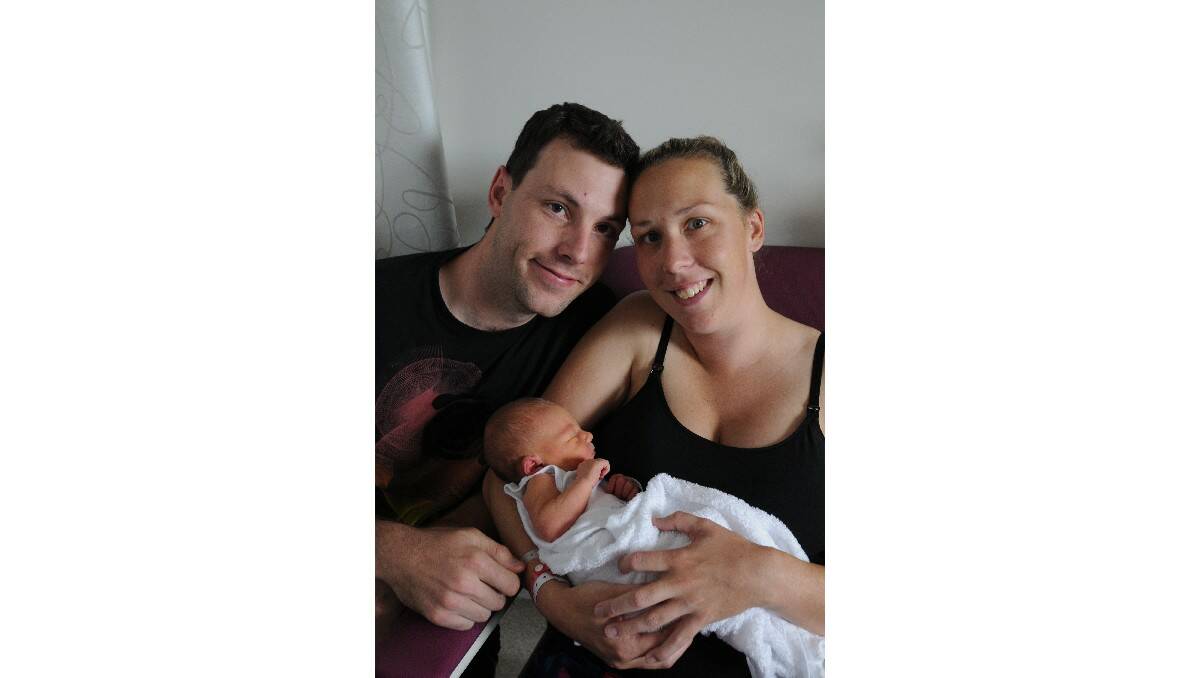 Arya Coughlan, pictured with her parents Andrew and Shea, was born on April 15.