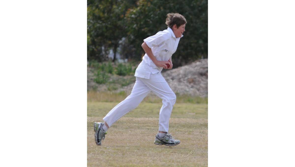 CRICKET: Dean Manning running in to bowl as Cavaliers played SJS-CYMS on Saturday. Photo: STEVE GOSCH
