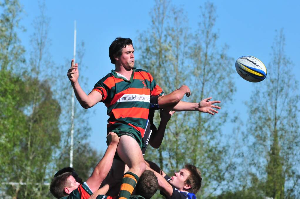 LINE-OUT LEAP: Adam Harrison is tossed up during the Orange City 10s tournament at Pride Park.