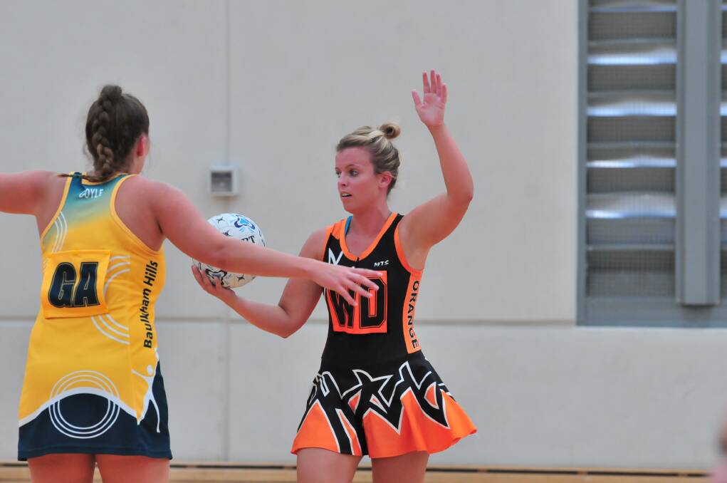 Orange A's Amanda Hurford against Baulkham Hills A on Saturday. Photo: JUDE KEOGH