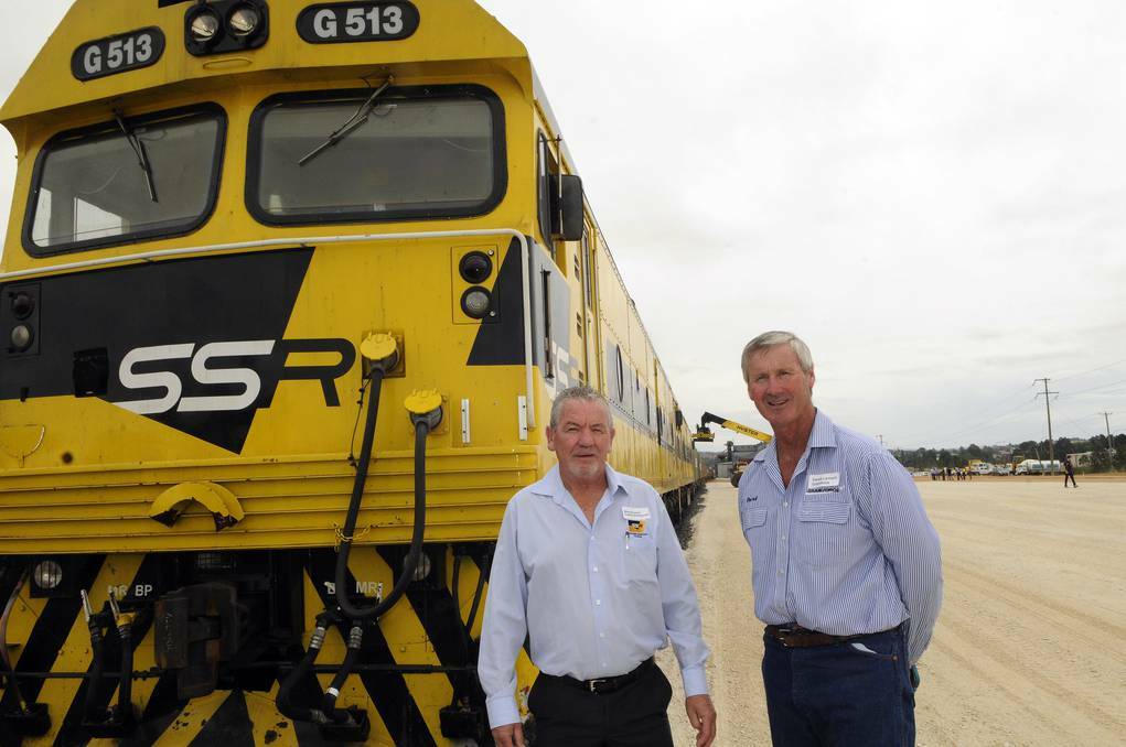 BATHURST: Southern Shorthaul Rail director and proud former Bathurst boy Milton Bromwich (left) with Derek Larnach from the Kelso-based Grainforce Commodities at last week's official opening of the new local rail terminal. 010914pderek2