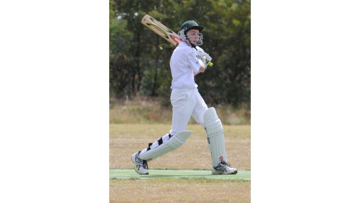 CRICKET: Angus Gorman hits out as Cavaliers played SJS-CYMS on Saturday. Photo: STEVE GOSCH