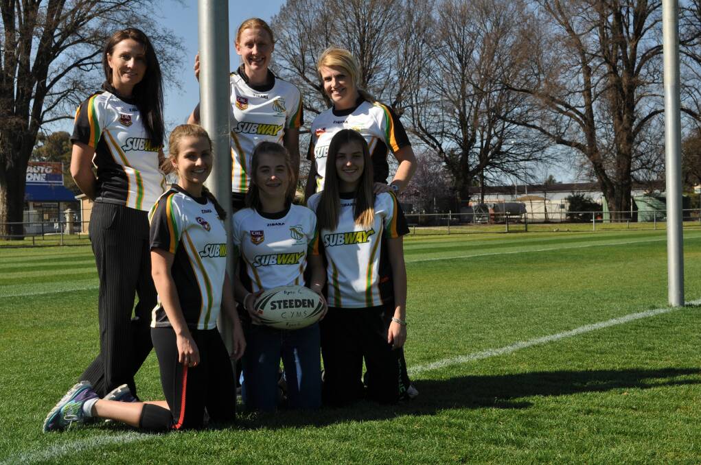 LEAGUE OF THEIR OWN: CYMS league tag girls (back) Mandy Moore, Nicole Williamson, Kate Foran, (front) Tori Moore, Nikki Daquino, Holly Gibson. 