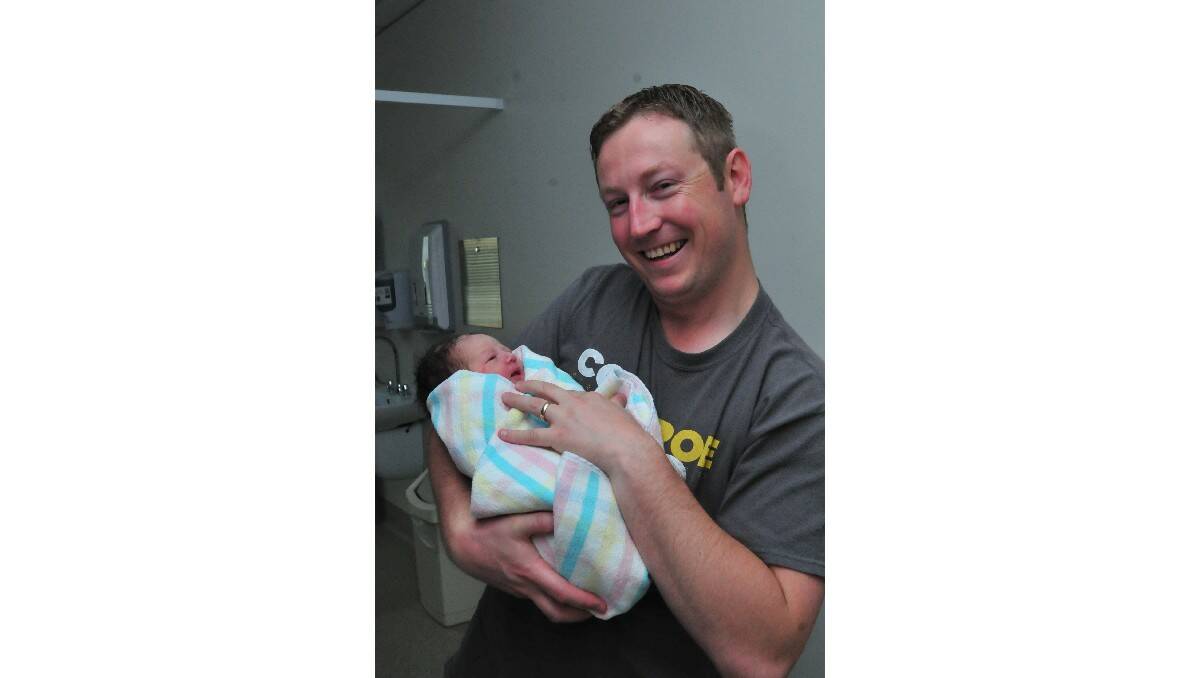 Eleanor Roe, pictured with her father Wayne Roe, was born on December 9. Eleanor's mother is Rhiannon Roe.