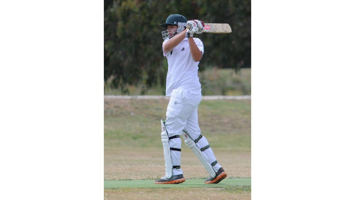 CRICKET: Kel Smith hits out in the Cavalier SJS-CYMS game on Saturday. Photo: STEVE GOSCH