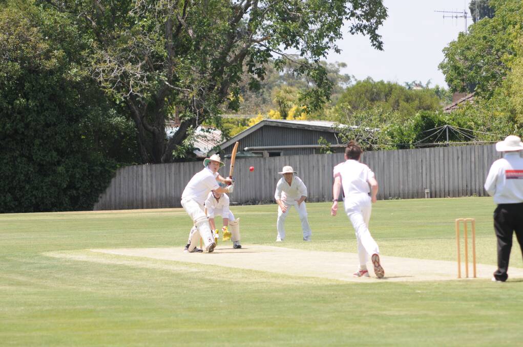 CRICKET: Centrals' Mick Walker attempts to hit out against Kinross' Tommy Rogers in their ODCA first grade game at Kinross on Saturday. Photo: LUKE SCHUYLER