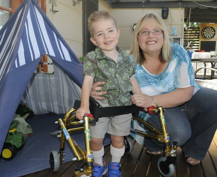 BATHURST: Mum Melinda Owens is calling on the community to help her buy a modified car that could accommodate her son Darius. Photo: CHRIS SEABROOK 012714cdarius