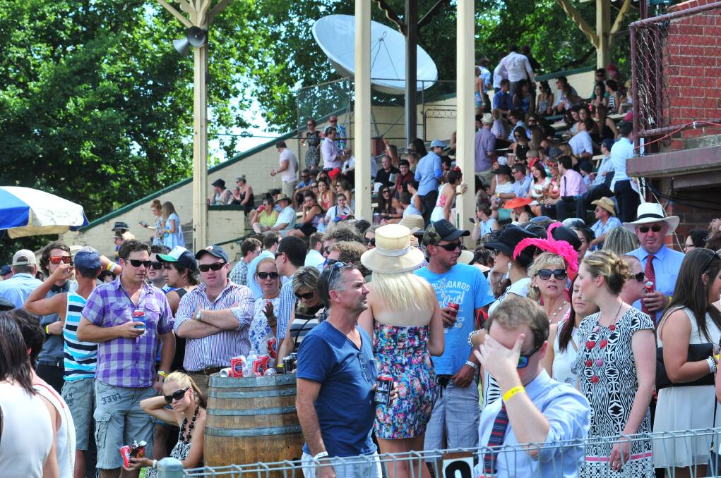 STYLE IN NUMBERS: A healthy crowd was on hand at the Orange Picnic Races on Saturday. Photo: JUDE KEOGH