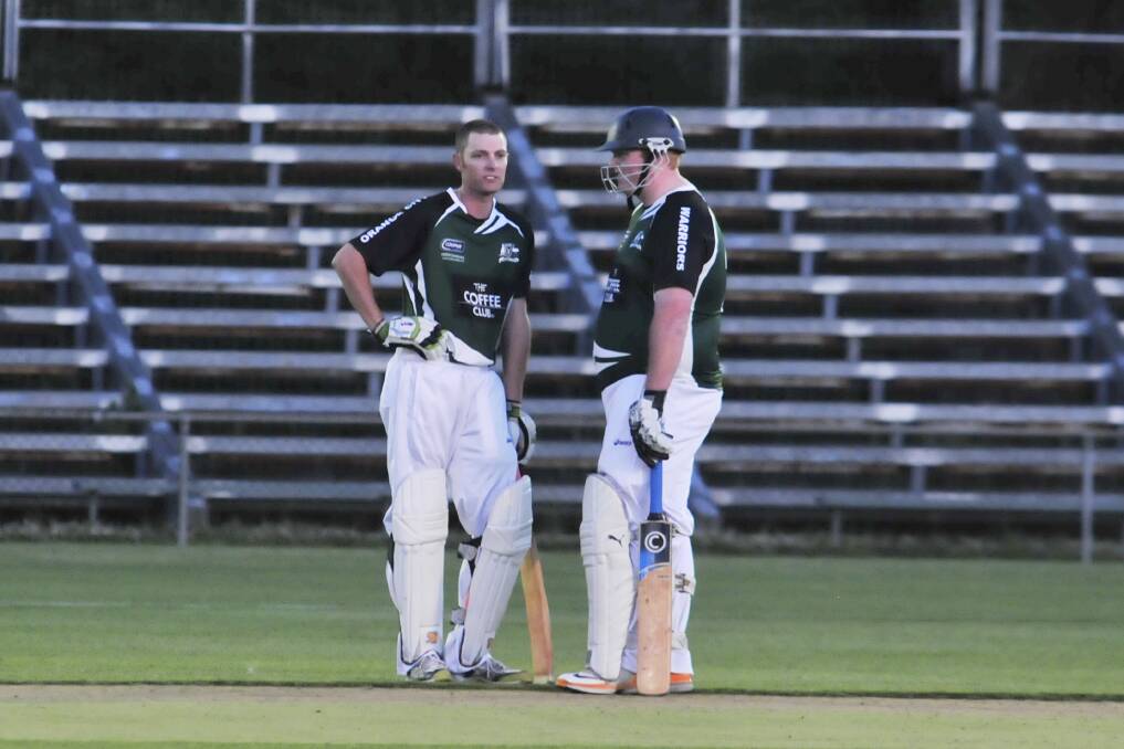 CRICKET: Orange City's Shaun Grenfell and Adam Cowden against Metro-Wanderers in ODCA Royal Htel Cup on Friday night. Photo: JUDE KEOGH