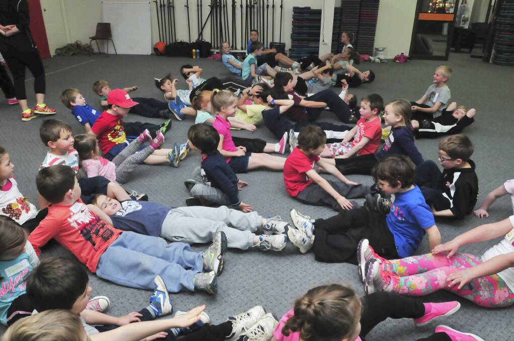 UNDER ORDERS: Kids get fit at boot camp at Orange Central Fitness. Photo: JUDE KEOGH